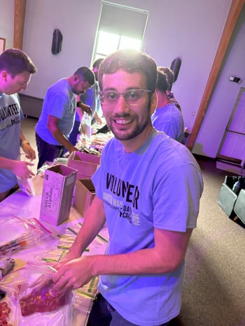 Justin Strahin assembles a personal care kit