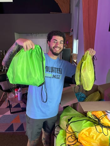 Maliek Fuller-Williamson poses with completed kits